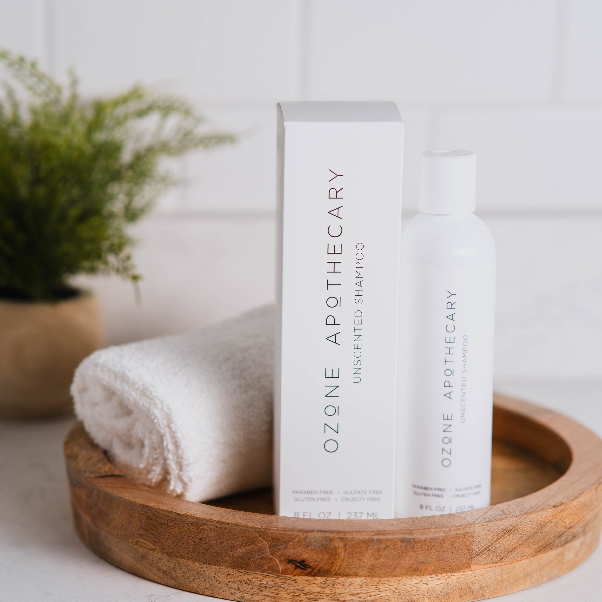 Unscented ozone shampoo on countertop with box
